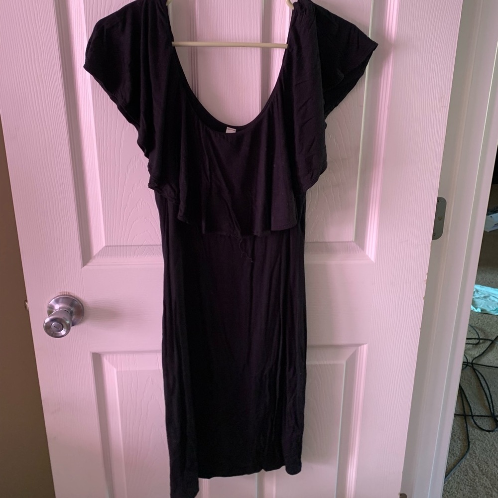 Black, tight, off shoulder or ruffled sleeve dress